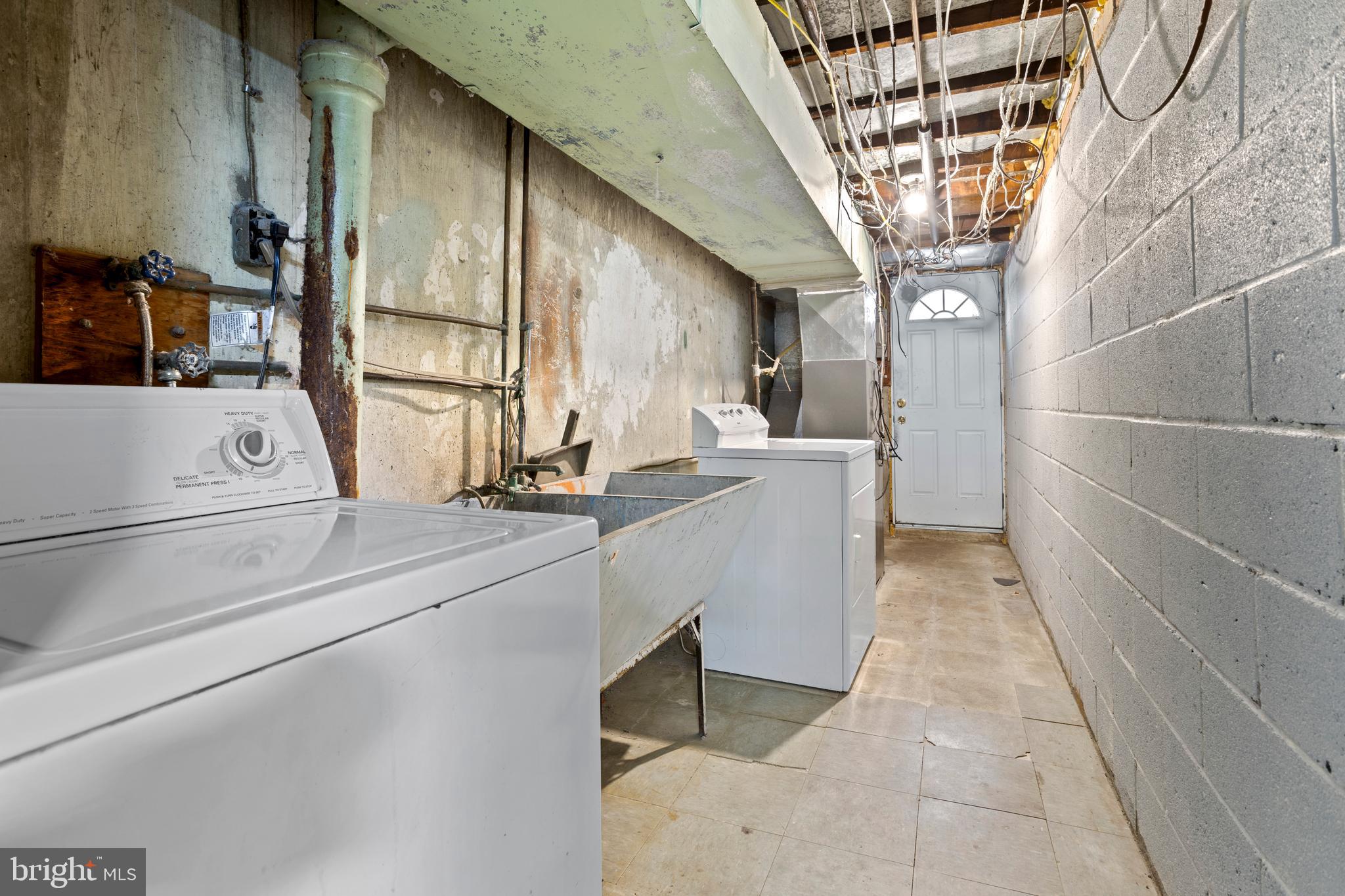 969 Grant Road Folcroft, PA 19032 - Photo 19 of 20 a kitchen with a sink and chandelier