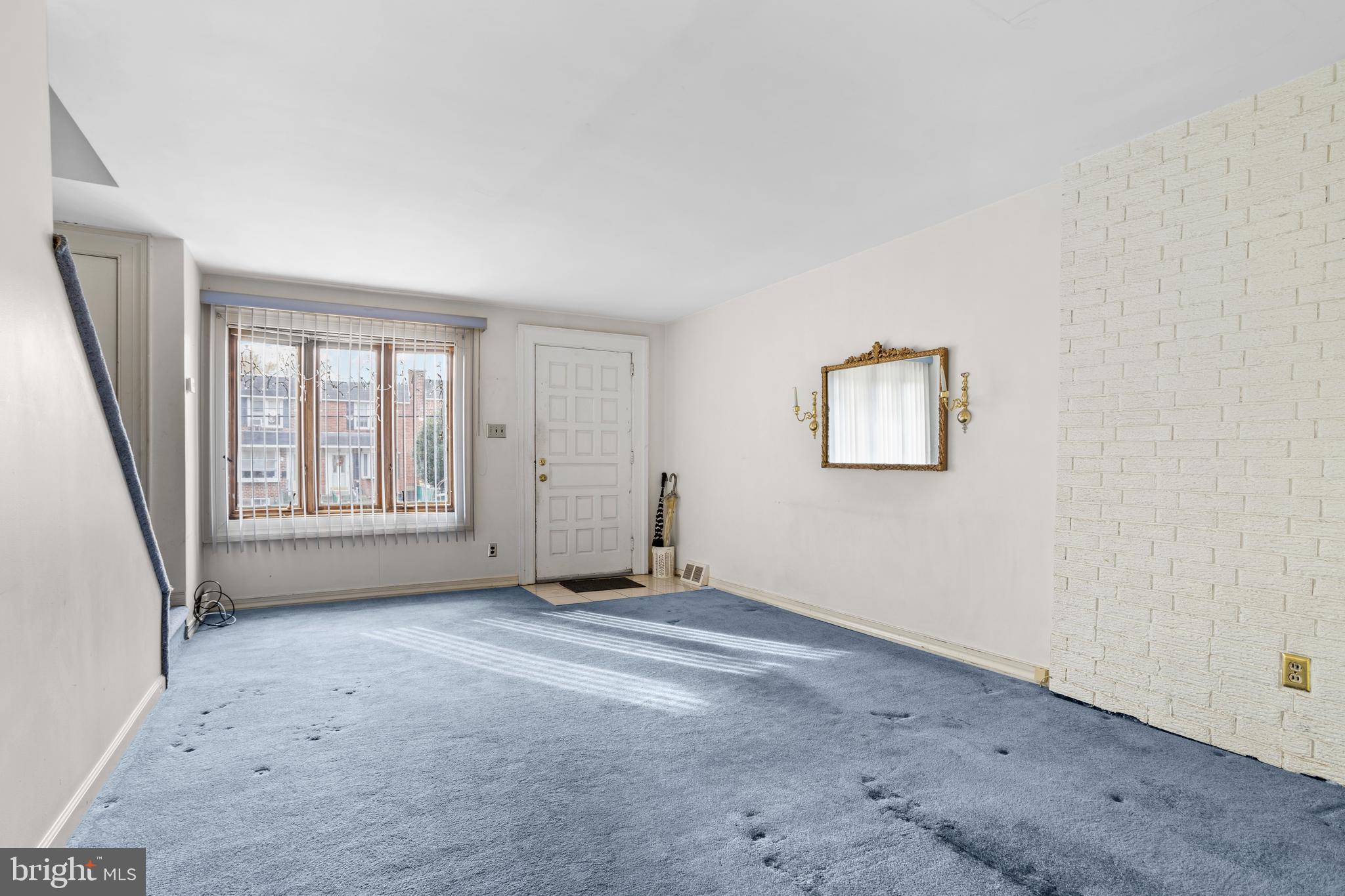 969 Grant Road Folcroft, PA 19032 - Photo 4 of 20 a view of an empty room with a window
