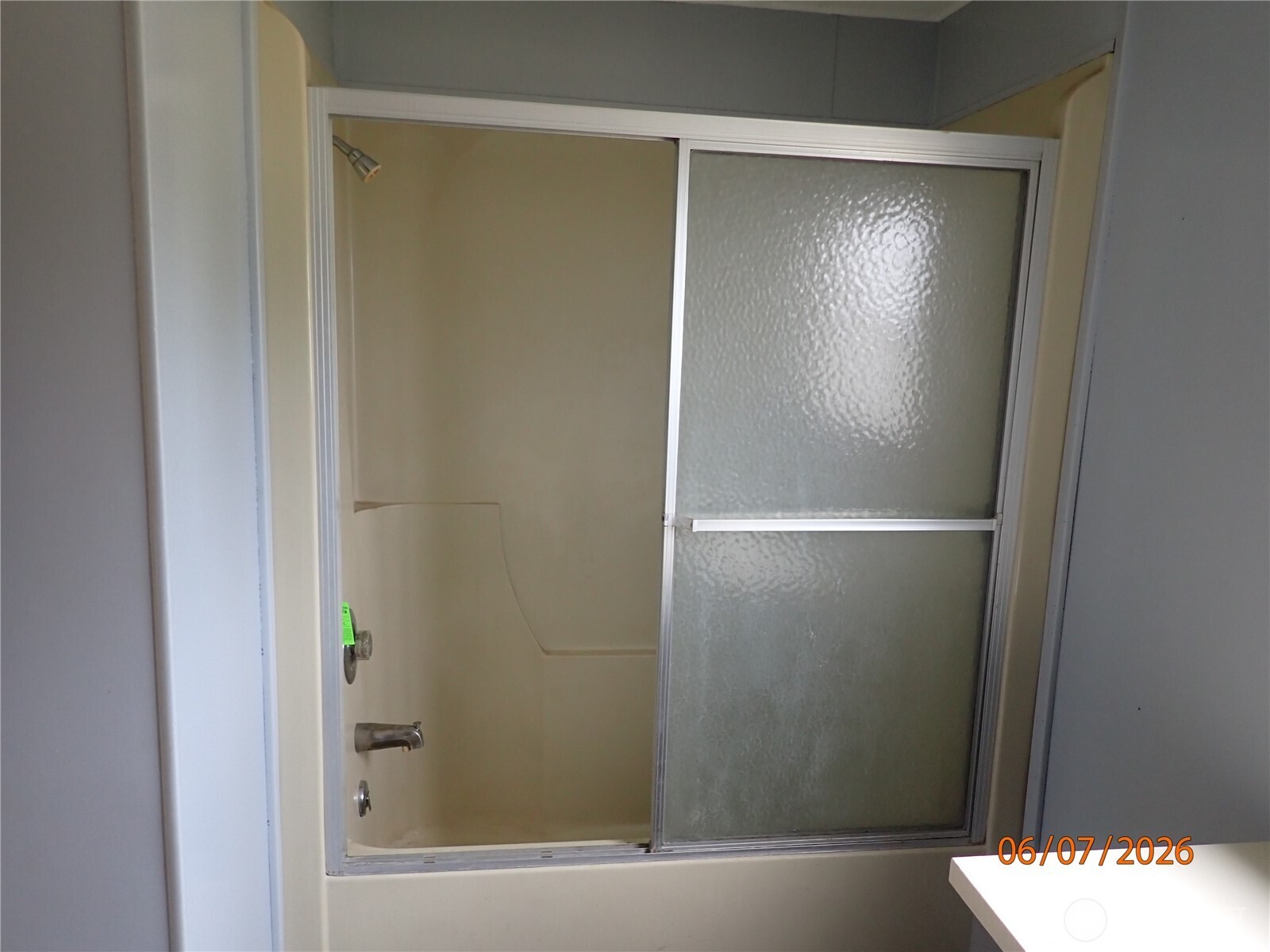 9217 183rd Avenue Southwest Rochester, WA 98579 - Photo 22 of 26 a bathroom with a glass shower door