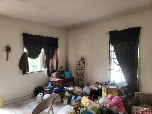 a room with furniture and window