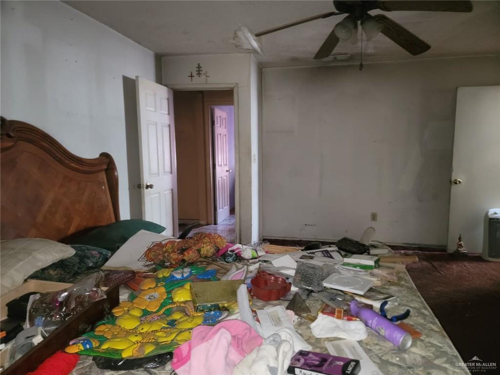 2132 Azteca Avenue McAllen, TX 78503 - Photo 6 of 17 a bedroom with a bed and a dresser