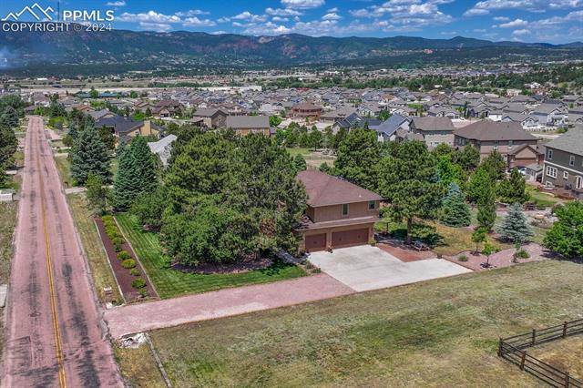 820 Bowstring Road Monument, CO 80132 - Photo 49 of 50 Bird's eye view with a mountain view