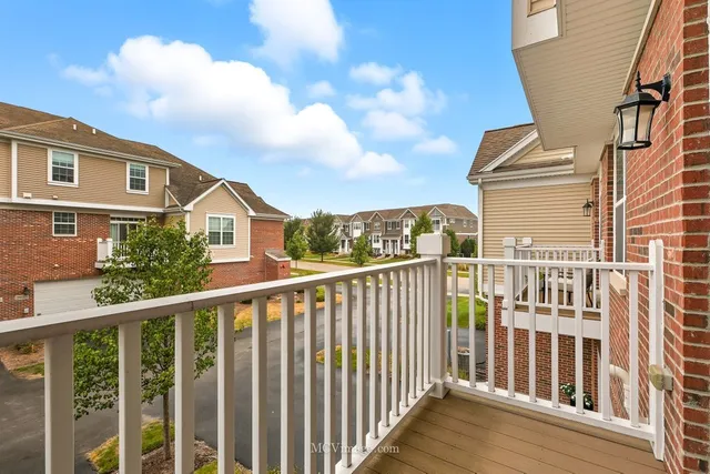 a view of a street from a balcony