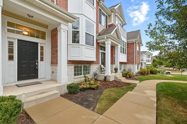 a view of a building with a yard