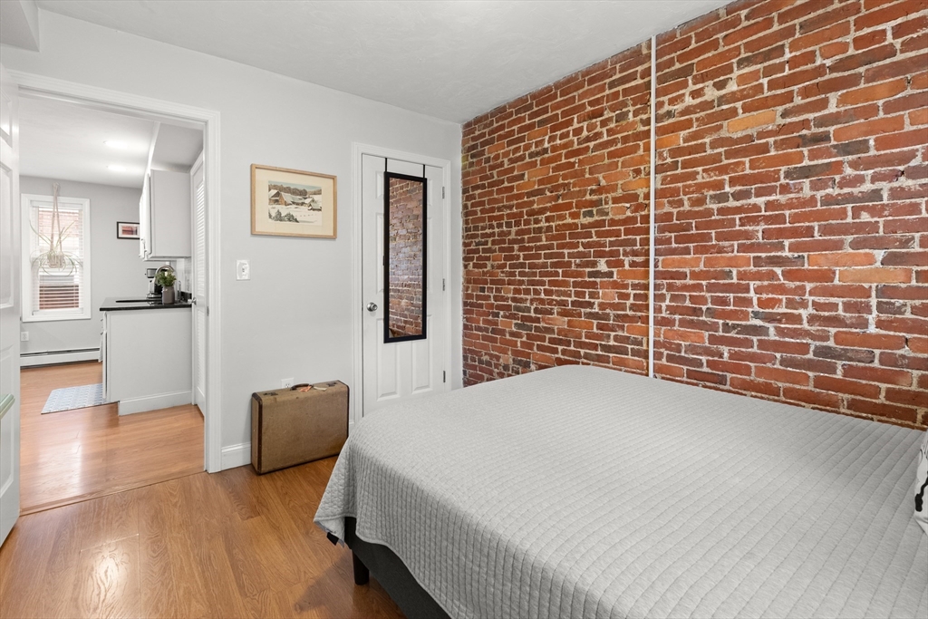 39 1/2 Harbor Street, Unit 1 Salem, MA 01970 - Photo 15 of 26 a view of livingroom with furniture and wooden floor