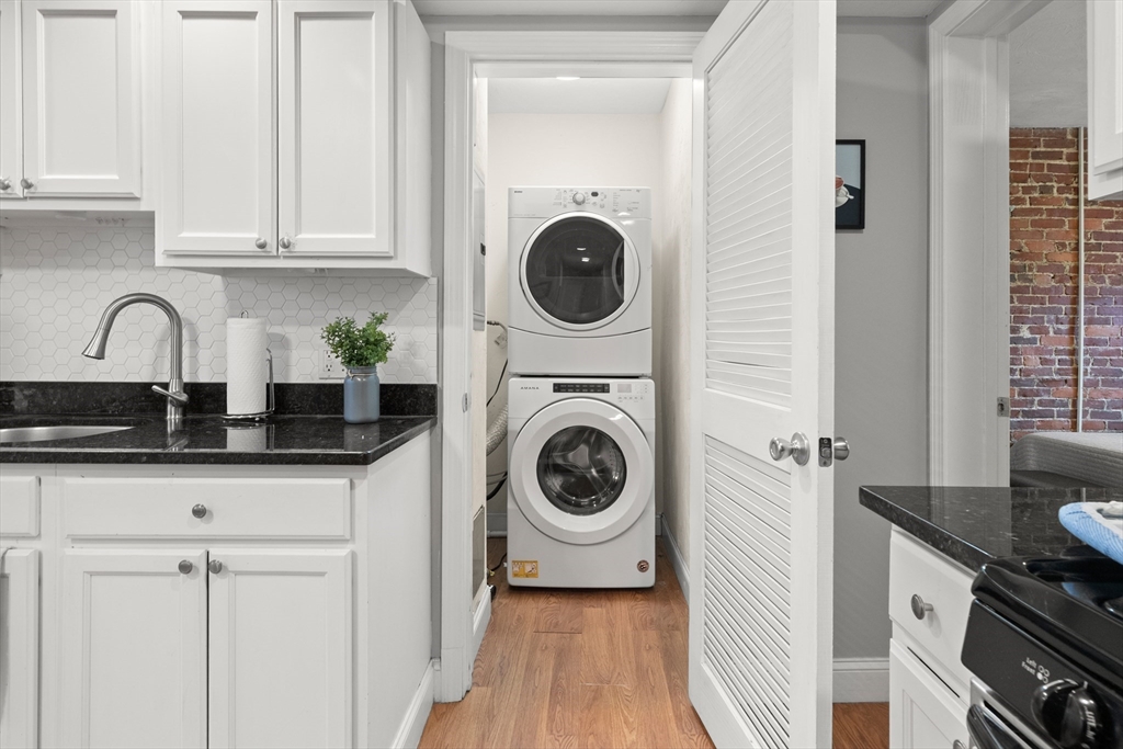 39 1/2 Harbor Street, Unit 1 Salem, MA 01970 - Photo 20 of 26 a view of a kitchen with sink and cabinets