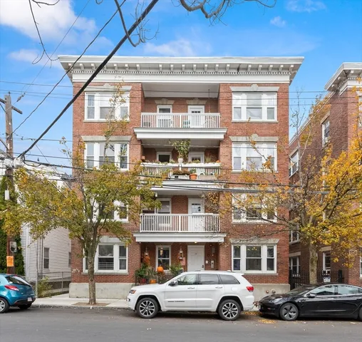 a car parked in front of a building