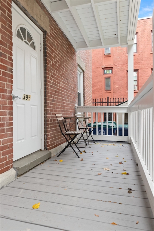39 1/2 Harbor Street, Unit 1 Salem, MA 01970 - Photo 21 of 26 a view of a balcony with chairs