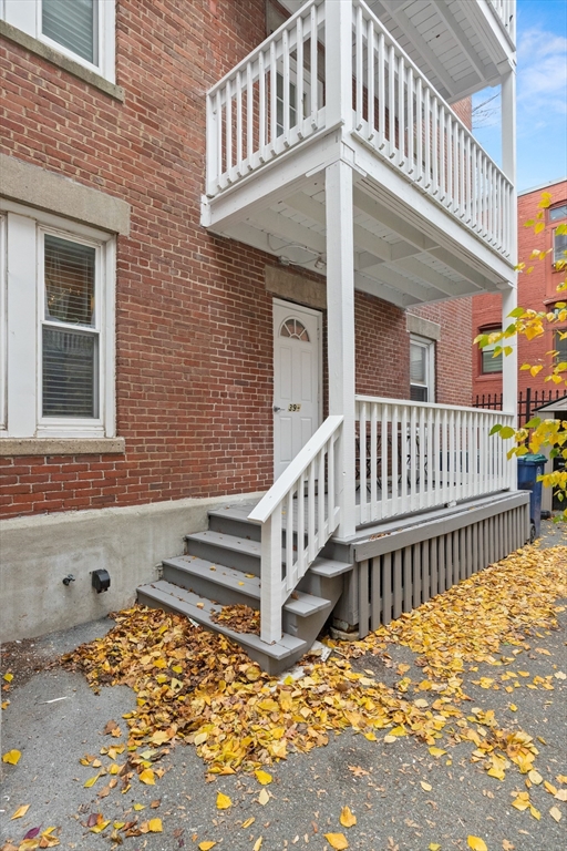 39 1/2 Harbor Street, Unit 1 Salem, MA 01970 - Photo 22 of 26 a view of a house with wooden deck