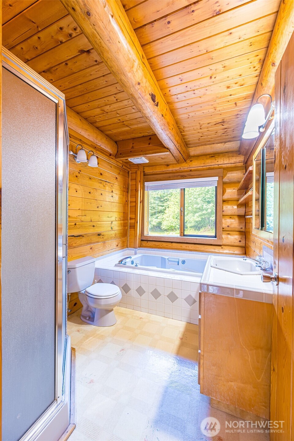 1422 Grauel-Ramapo Road Port Angeles, WA 98363 - Photo 13 of 40 a bathroom with a tub and sink