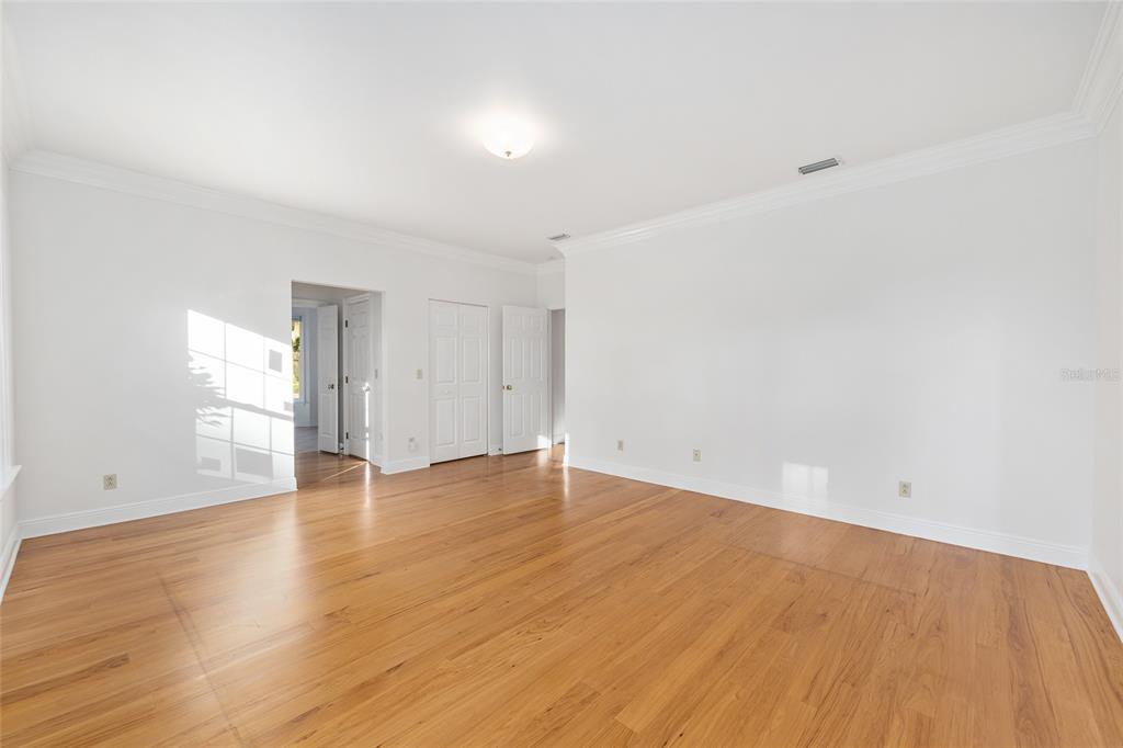 6581 South Magnolia Avenue Ocala, FL 34471 - Photo 13 of 59 wooden floor in an empty room