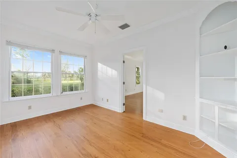 a view of a hallway with white walls