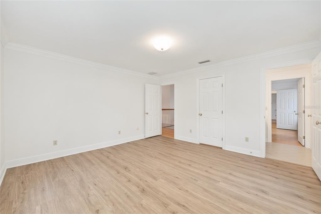 6581 South Magnolia Avenue Ocala, FL 34471 - Photo 33 of 59 a view of empty room with wooden floor