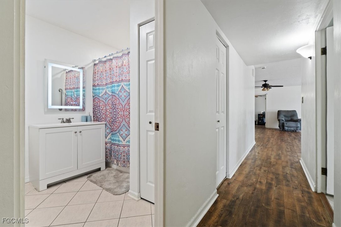 610 East Avenida Del Rio Clewiston, FL 33440 - Photo 29 of 49 a bathroom with a sink and a mirror