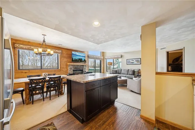 a bedroom with a bed and a flat tv screen