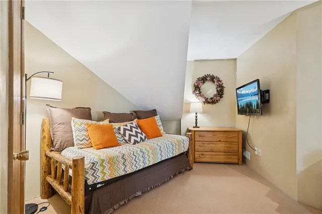 a workspace with furniture and a window