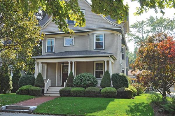 62 Page Road Newton, MA 02460 - Photo 1 of 1 a front view of a house with a garden