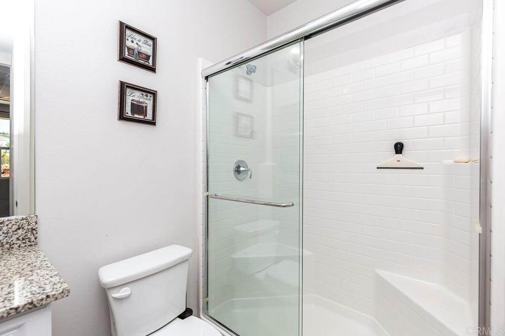 1281 Palomar Circle Escondido, CA 92027 - Photo 14 of 31 a bathroom with a shower and a toilet