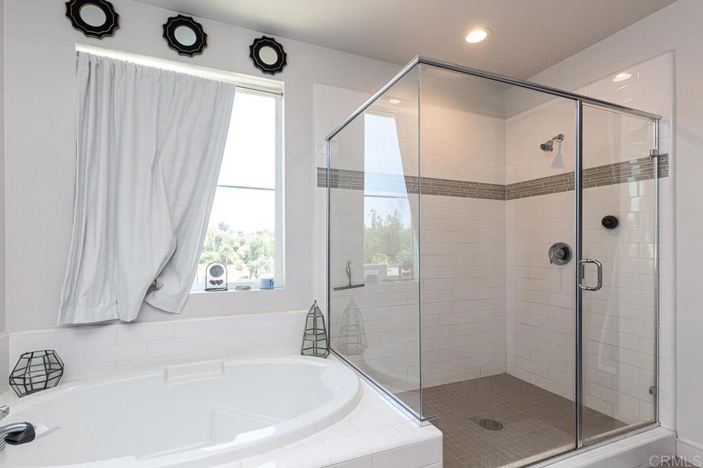 1281 Palomar Circle Escondido, CA 92027 - Photo 20 of 31 a bathroom with a bathtub and a shower