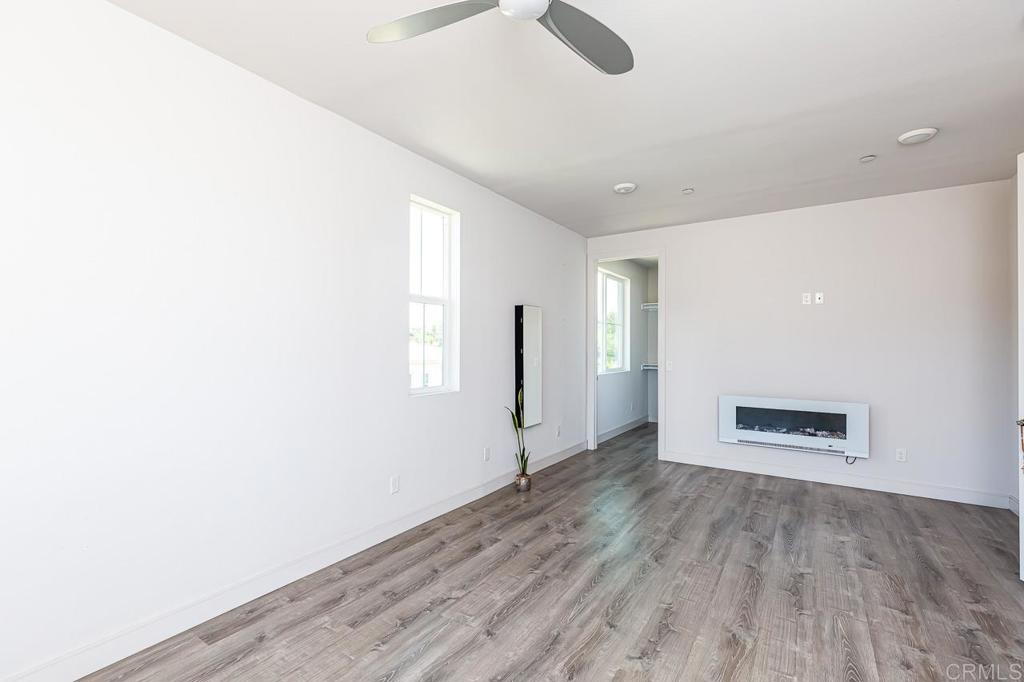 1281 Palomar Circle Escondido, CA 92027 - Photo 23 of 31 a view of empty room with wooden floor