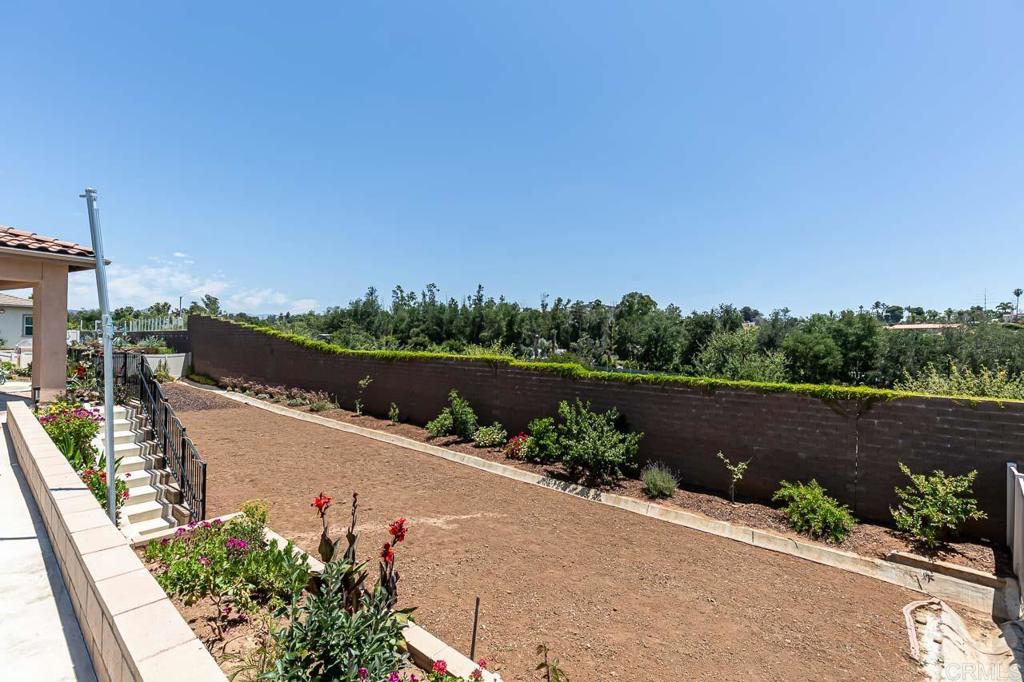 1281 Palomar Circle Escondido, CA 92027 - Photo 26 of 31 a view of a lake with a city view