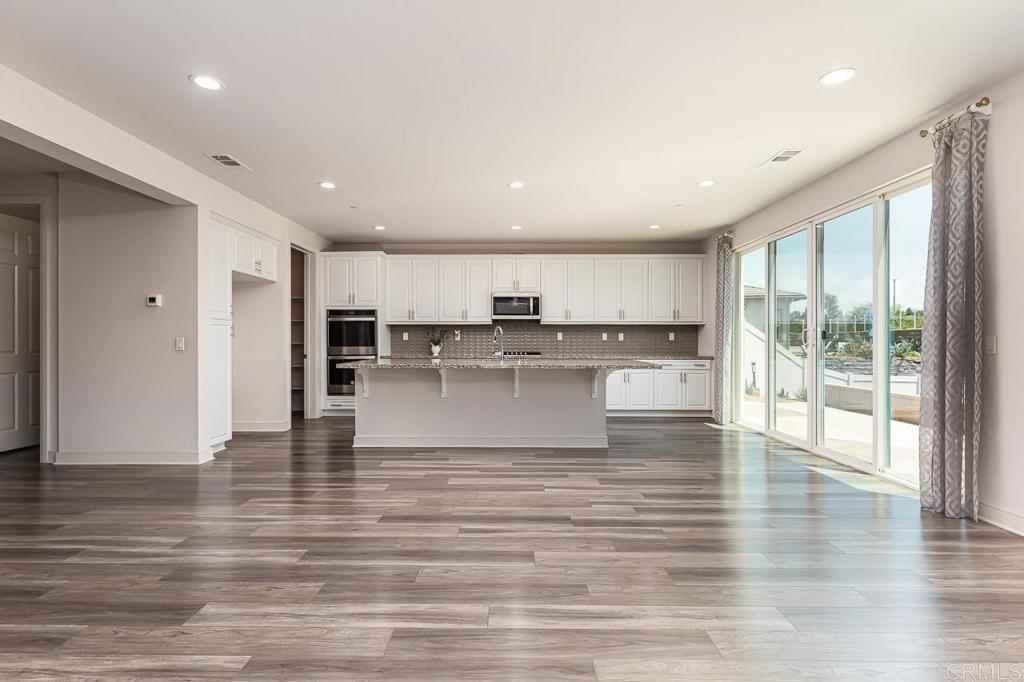 1281 Palomar Circle Escondido, CA 92027 - Photo 6 of 31 a view of kitchen with wooden floor