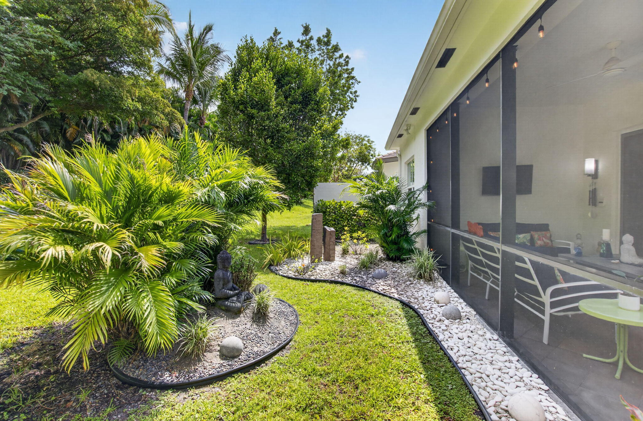 8263 Arabian Range Road Boynton Beach, FL 33473 - Photo 7 of 52 a view of a swimming pool with a potted plants