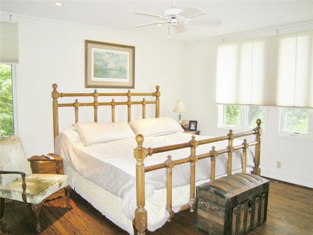 3217 Sherwood Road Sewanee, TN 37375 - Photo 12 of 20 Master bedroom. This home was designed so that every room has a view. It’s all on one level with no stairs to climb.