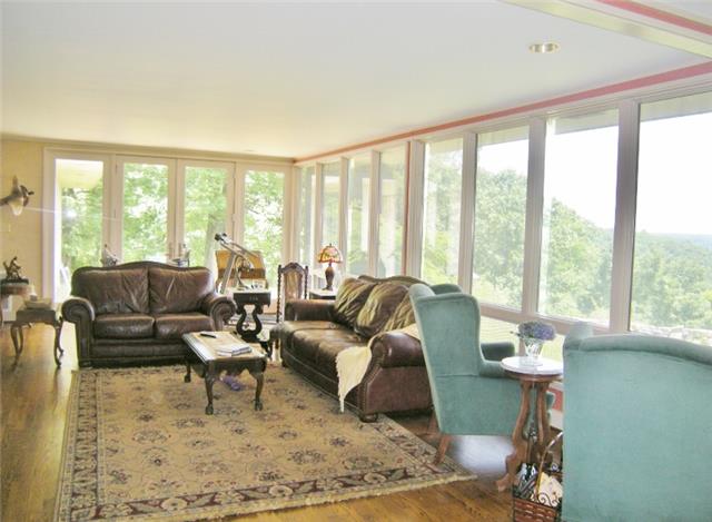 3217 Sherwood Road Sewanee, TN 37375 - Photo 3 of 20 Nestled among the trees this multi-season retreat was architecturally designed to capture the magnificent Mountain View.