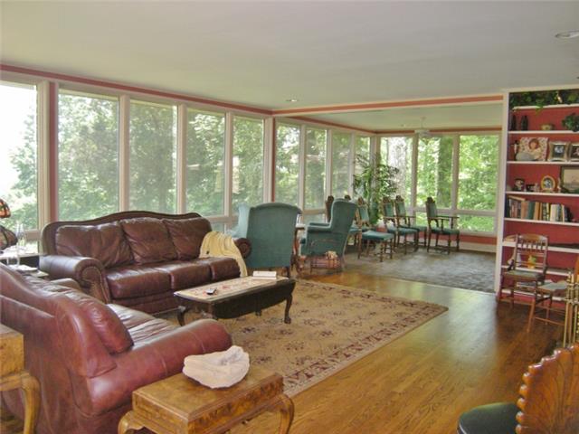 3217 Sherwood Road Sewanee, TN 37375 - Photo 5 of 20 The full window wall brings the beauty of the outside to your chairside.