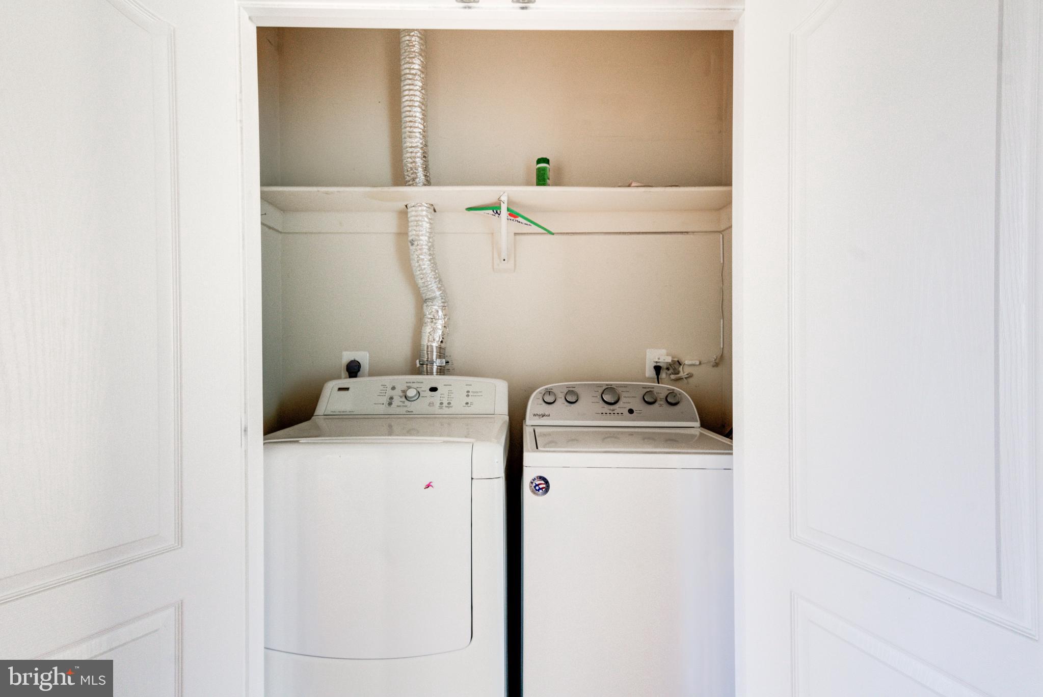 50 Rhode Island Avenue Northeast, Unit 2 Washington, DC 20002 - Photo 22 of 31 a utility room with dryer and washer