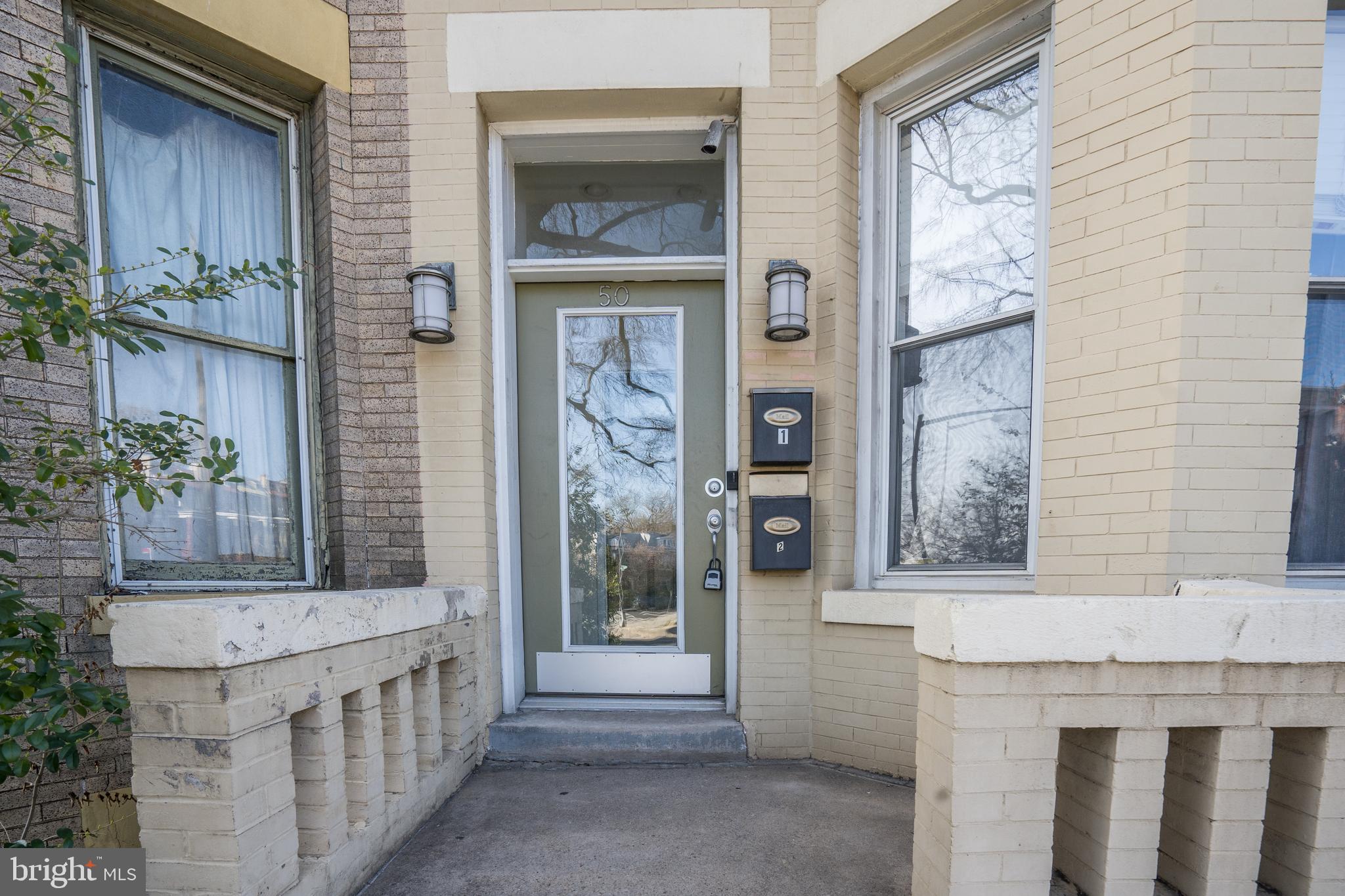 50 Rhode Island Avenue Northeast, Unit 2 Washington, DC 20002 - Photo 23 of 31 a view of an entryway with a front door
