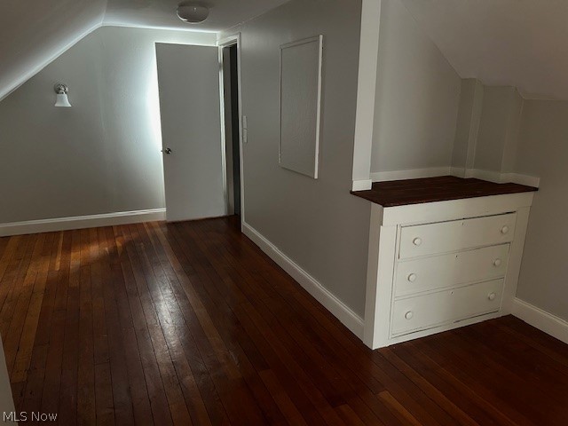 1256 Winston Road Cleveland, OH 44121 - Photo 9 of 13 Bonus room featuring hardwood / wood-style flooring and lofted ceiling