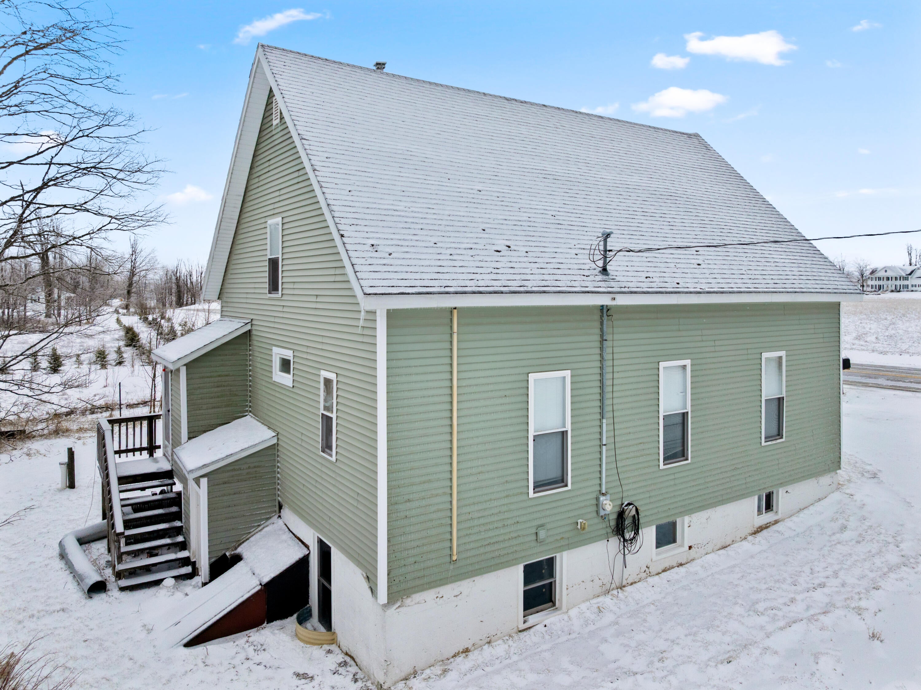 11825 Meridian Line Road Johannesburg, MI 49751 - Photo 4 of 45 vinyl siding