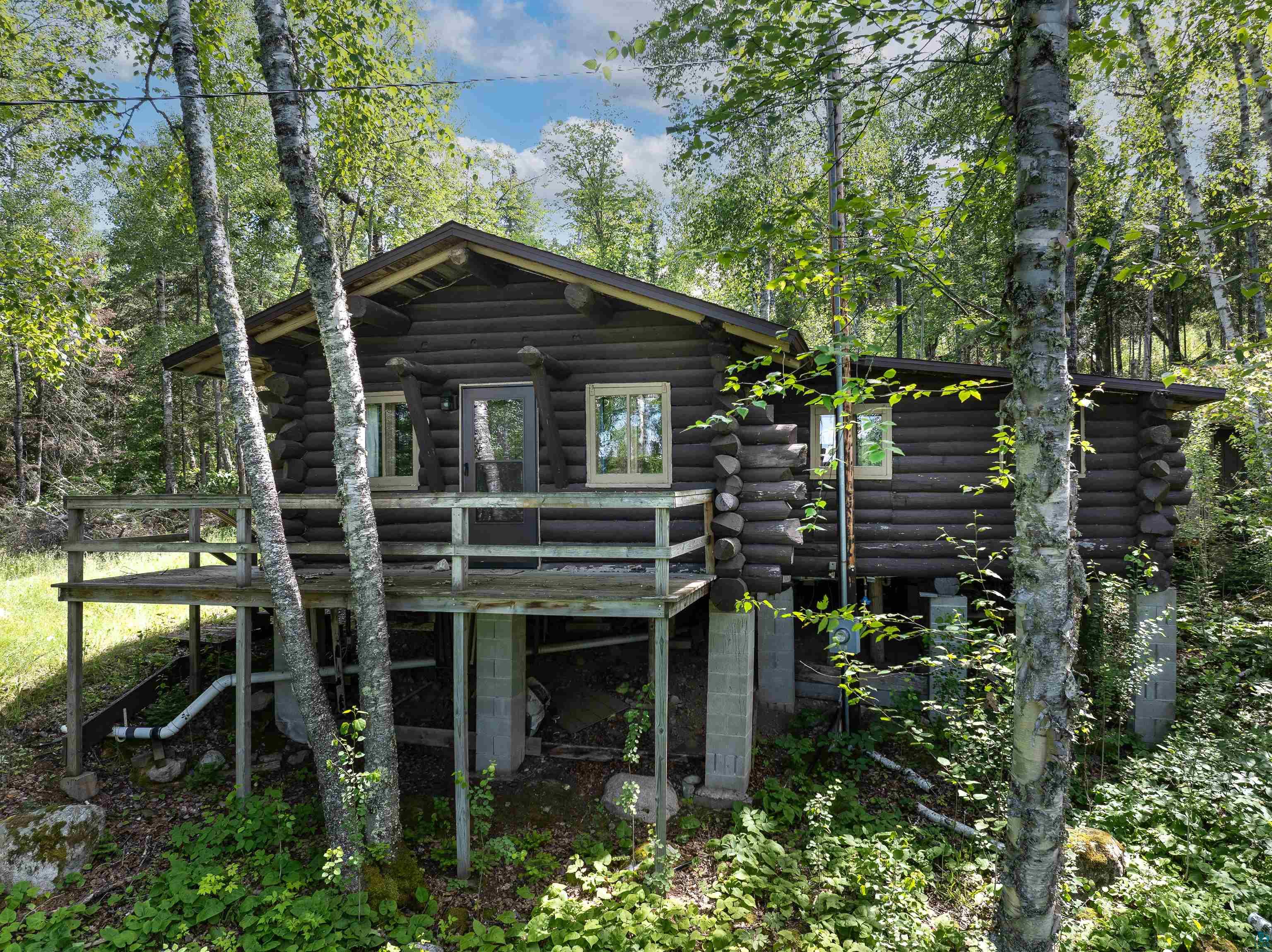 615 Kellys Lot Road Ely, MN 55731 - Photo 15 of 39 Back of house with a deck