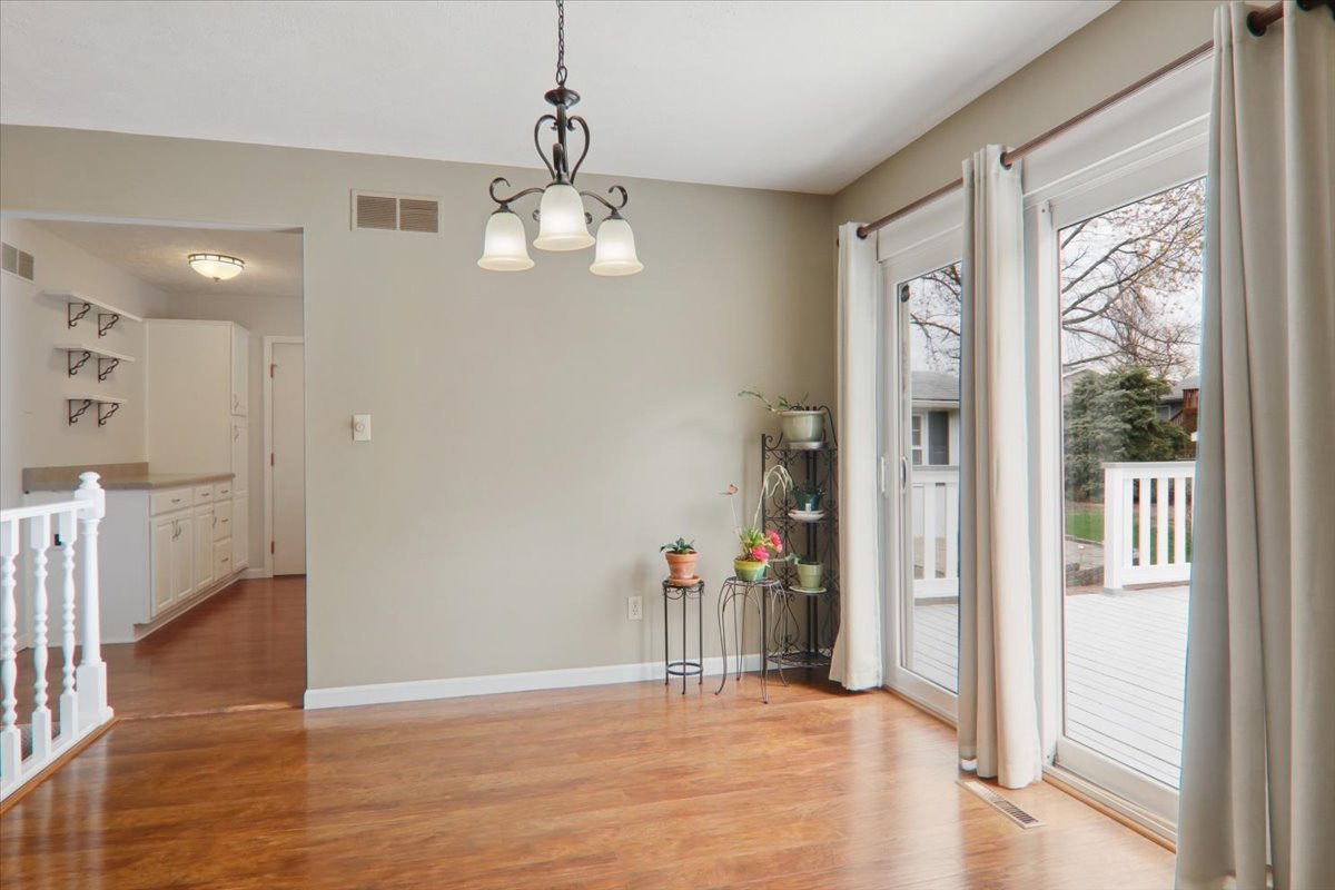 720 Lara Road Normal, IL 61761 - Photo 12 of 30 a view of a room with a windows and ceiling fan