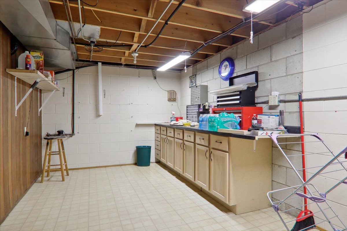 720 Lara Road Normal, IL 61761 - Photo 26 of 30 a storage room with cabinets