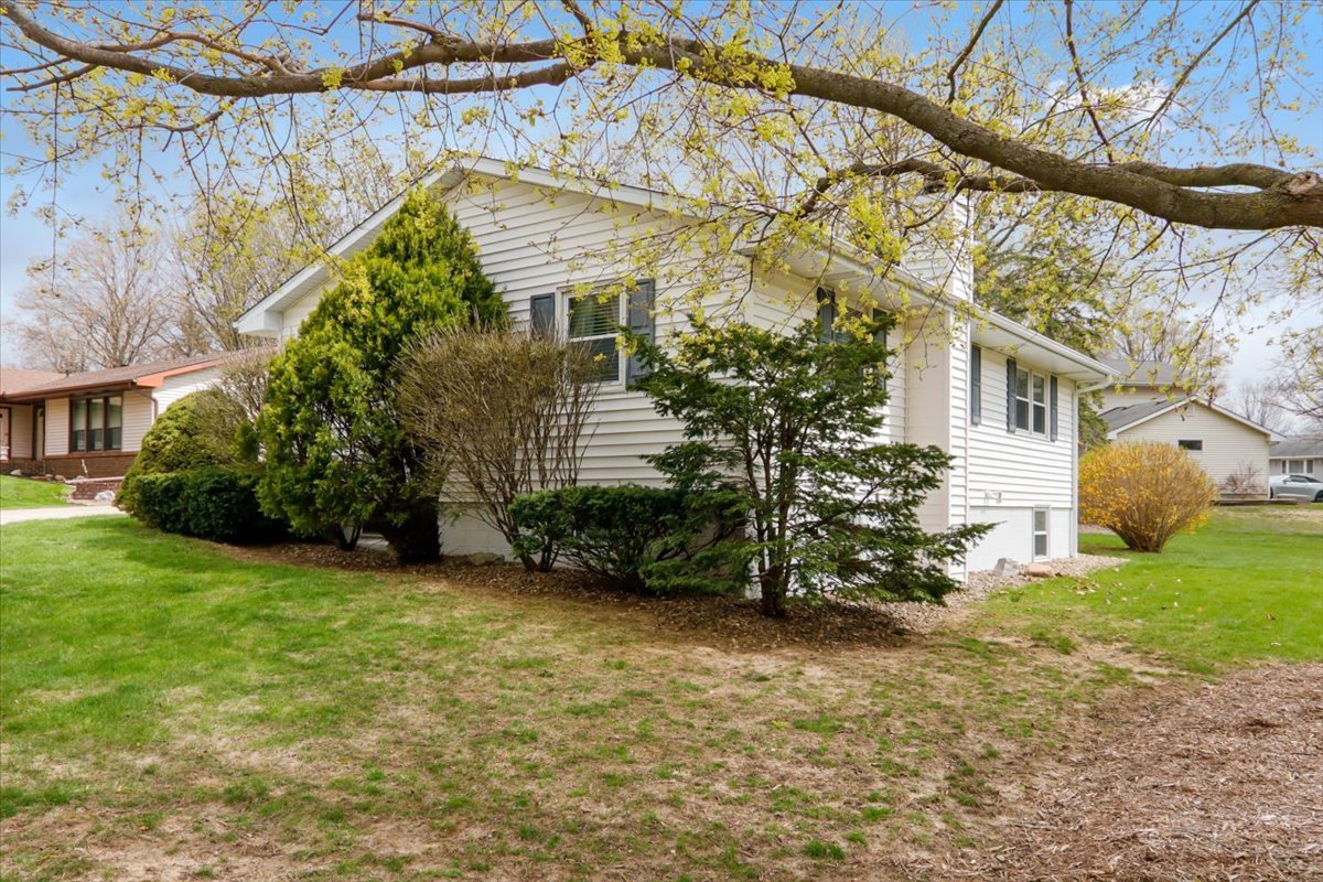 720 Lara Road Normal, IL 61761 - Photo 3 of 30 a view of a house with a yard