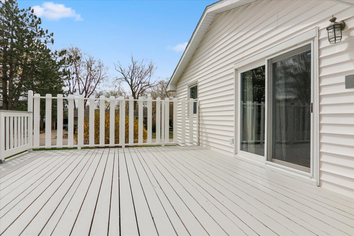720 Lara Road Normal, IL 61761 - Photo 4 of 30 a view of backyard with a deck and wooden floor