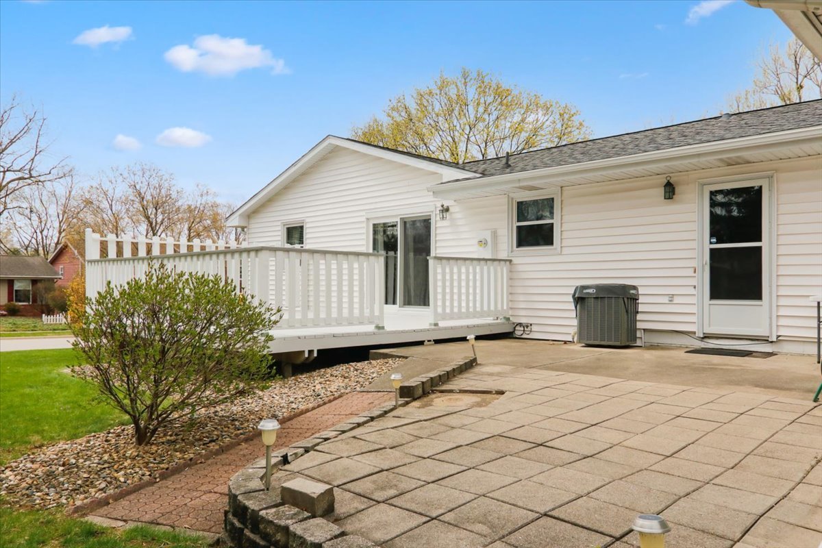 720 Lara Road Normal, IL 61761 - Photo 6 of 30 a view of a house with a backyard and a chair