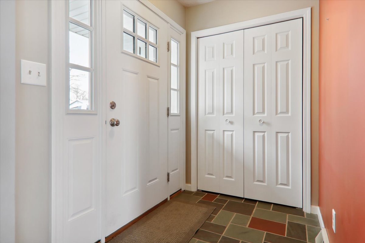 720 Lara Road Normal, IL 61761 - Photo 8 of 30 a view of an entryway with wooden floor