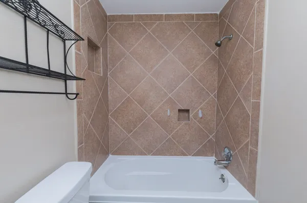 a bathroom with a bathtub