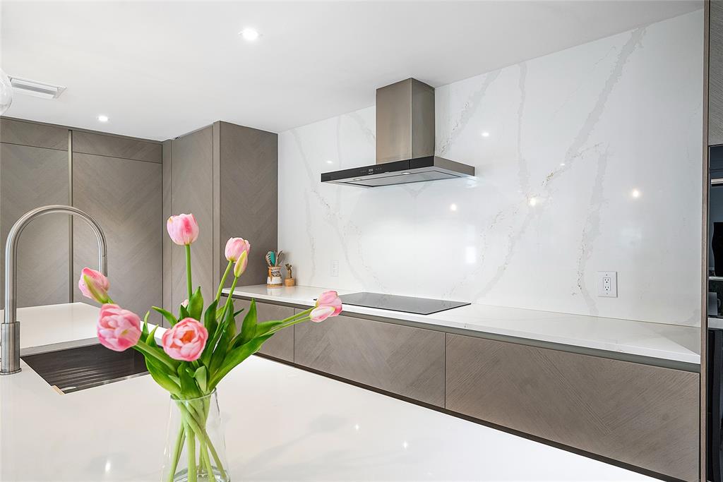 2233 Northeast 30th Court Lighthouse Point, FL 33064 - Photo 15 of 48 Built-in refrigerator/freezer on the left