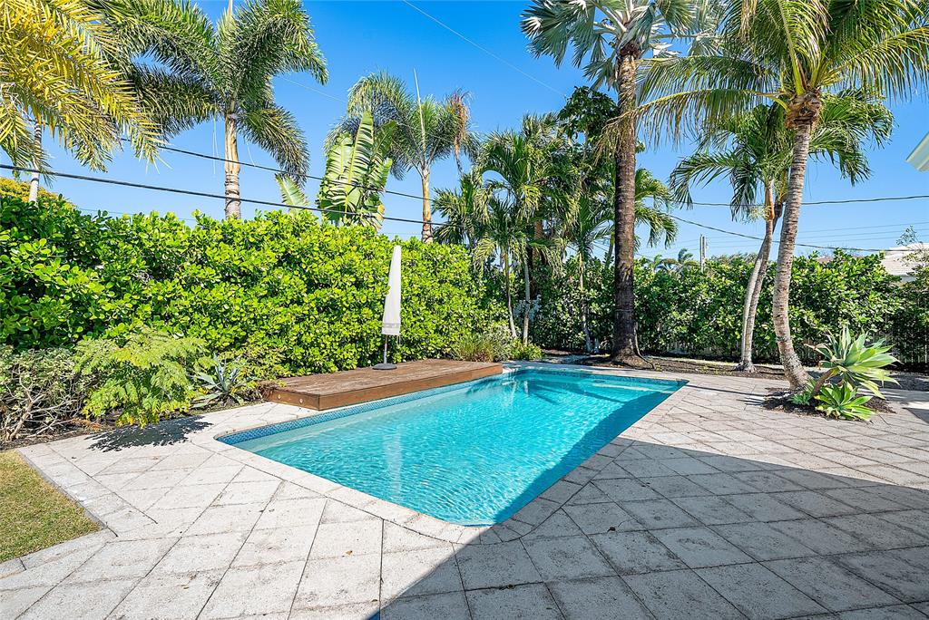 2233 Northeast 30th Court Lighthouse Point, FL 33064 - Photo 37 of 48 With a deck