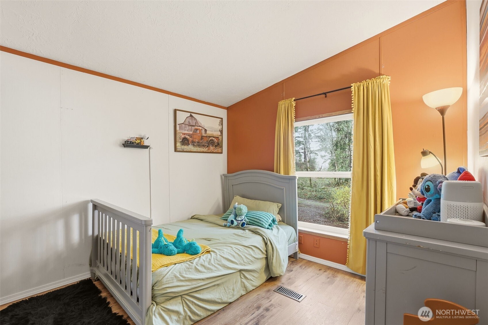 33501 112th Street Southeast Sultan, WA 98294 - Photo 19 of 31 a bedroom with furniture and a window