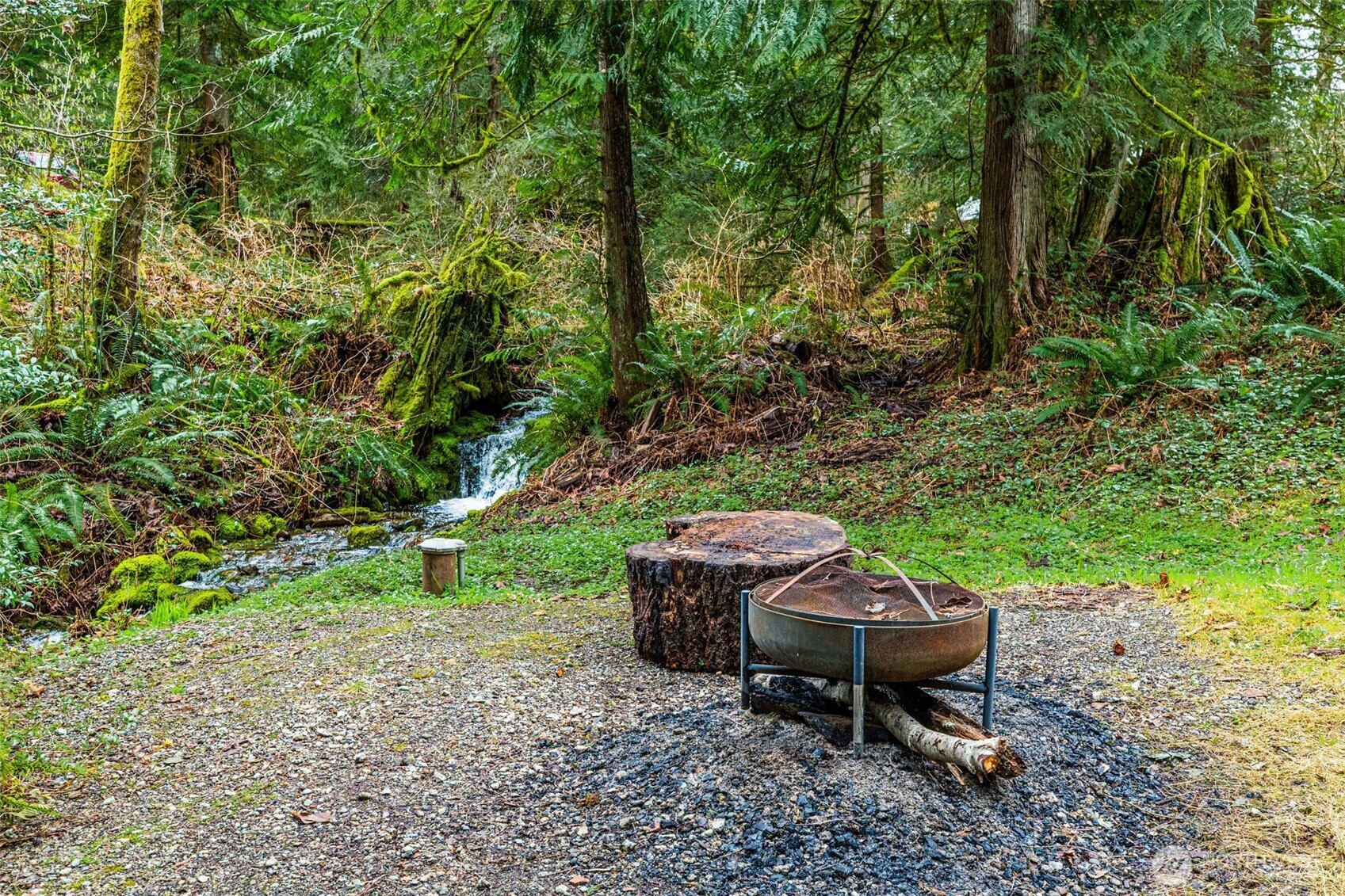 33501 112th Street Southeast Sultan, WA 98294 - Photo 25 of 31 a backyard of a house with outdoor seating