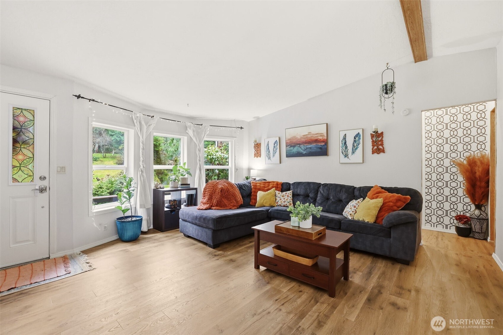 33501 112th Street Southeast Sultan, WA 98294 - Photo 5 of 31 a living room with furniture and a large window