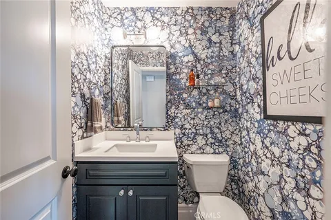 a bathroom with a sink and a toilet