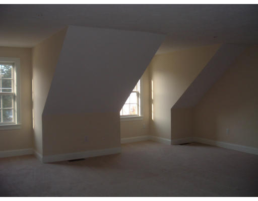 1975 Middlesex Street, Unit 7 Lowell, MA 01851 - Photo 5 of 6 a view of an empty room and window