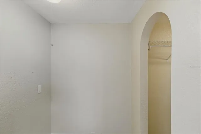 a bathroom with a toilet sink and shower